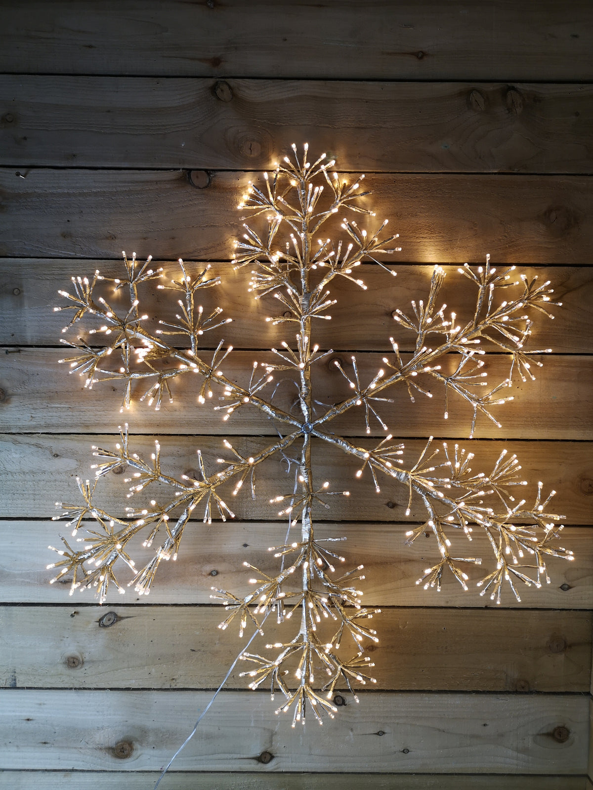 Premier 90cm Gold Starburst Snowflake Wall Window Decoration With 660 Warm White LEDs