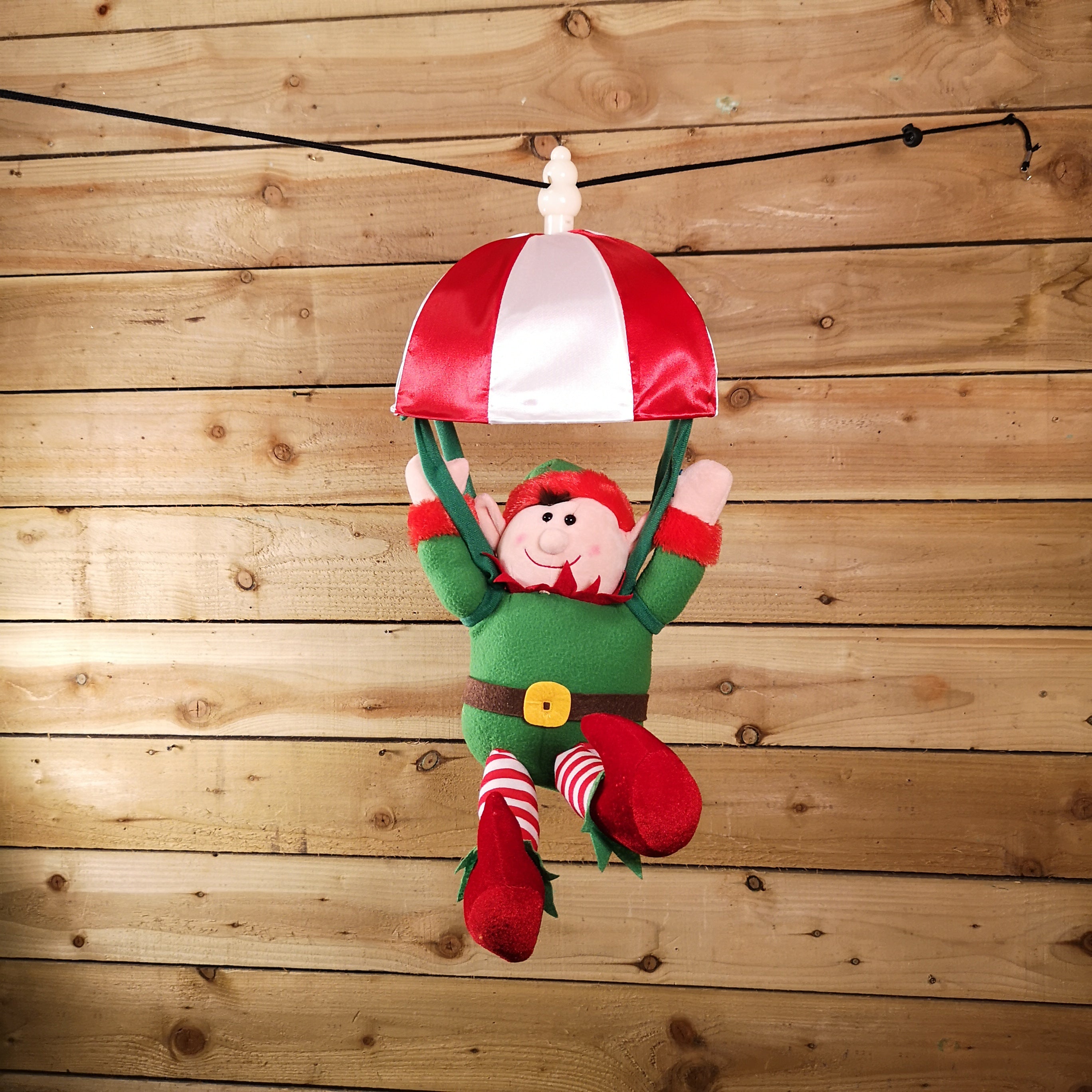 Premier Christmas Animated & Musical Kicking Leg Parachuting Elf