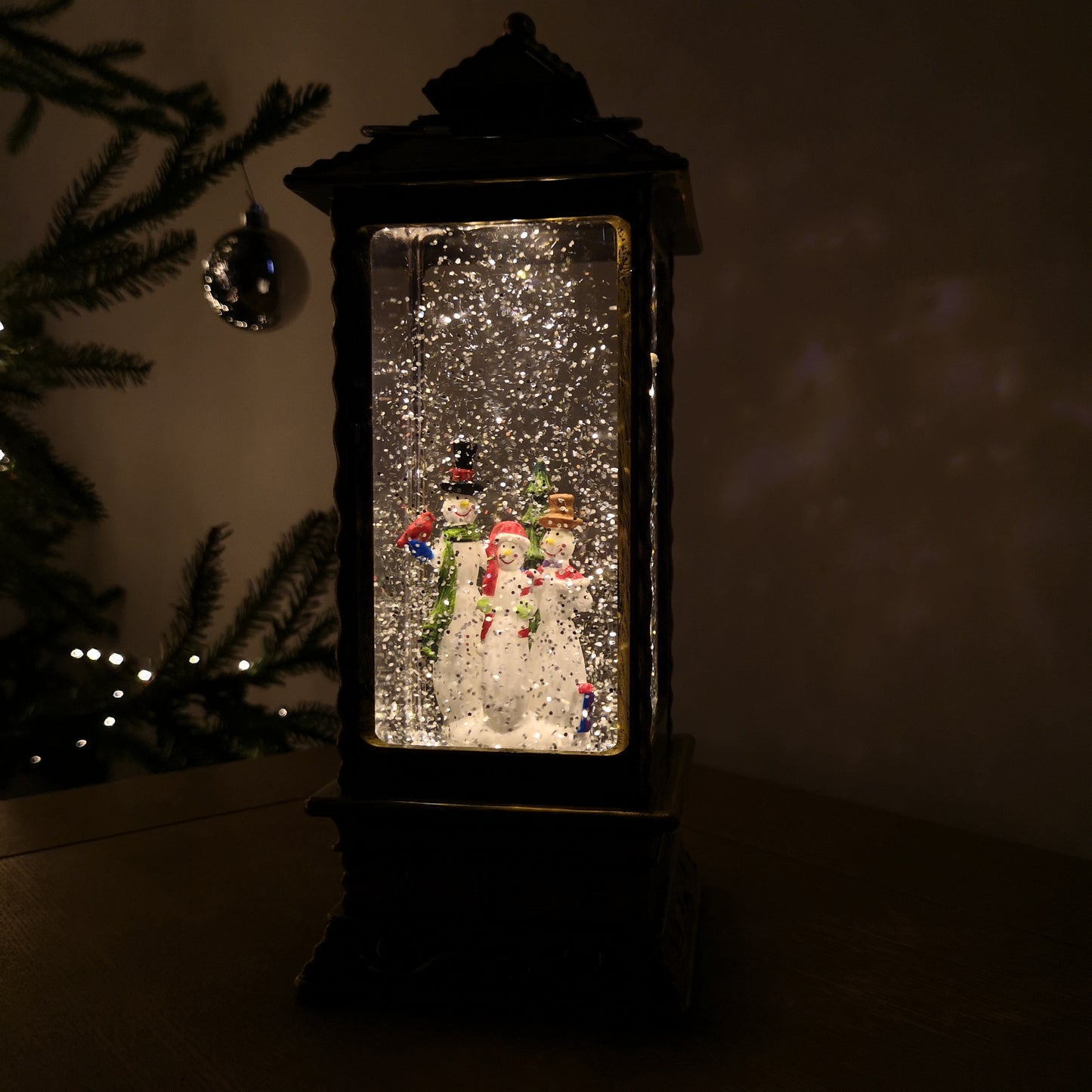 27cm Premier Glitter Water Spinner LED Lantern Christmas Decoration with Snowman Scene