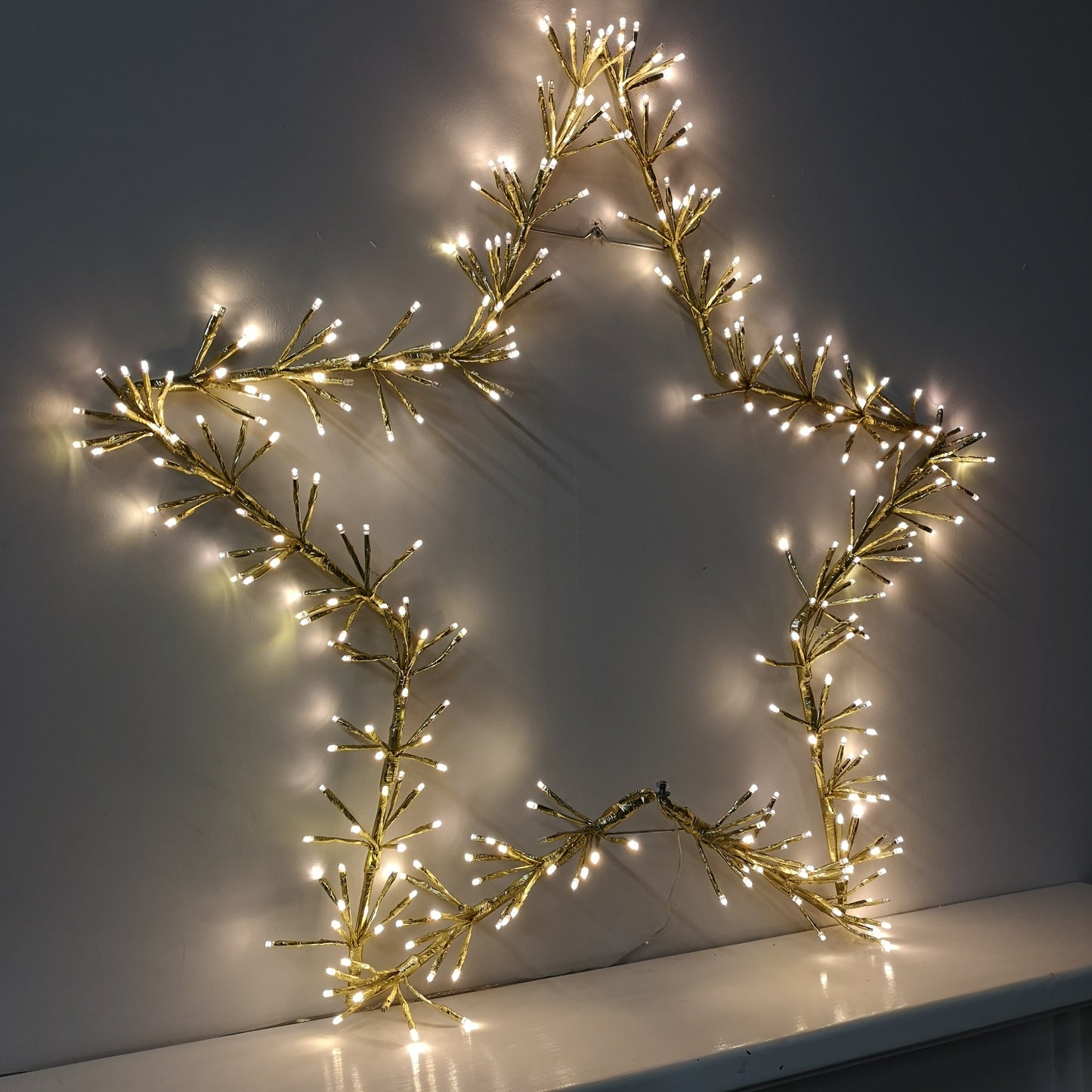 90cm Premier Twinkling LED Gold Star Silhouette Christmas Decoration in Warm White