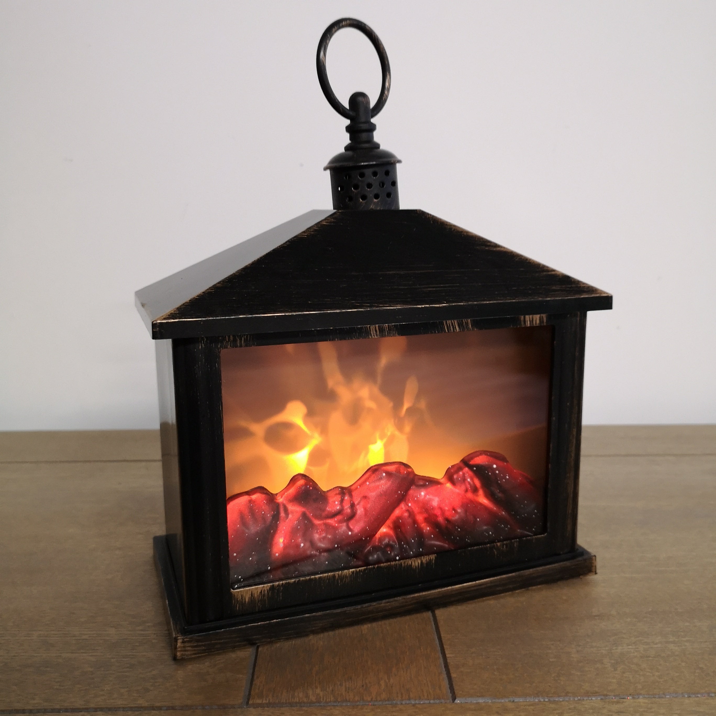 28cm Premier Christmas Battery Operated Fireplace Lantern with Realistic Flame Effect in Rustic Bronze