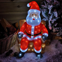 60cm Cool White 100 LED Christmas Light Up Outdoor Acrylic Sitting Santa in Chair