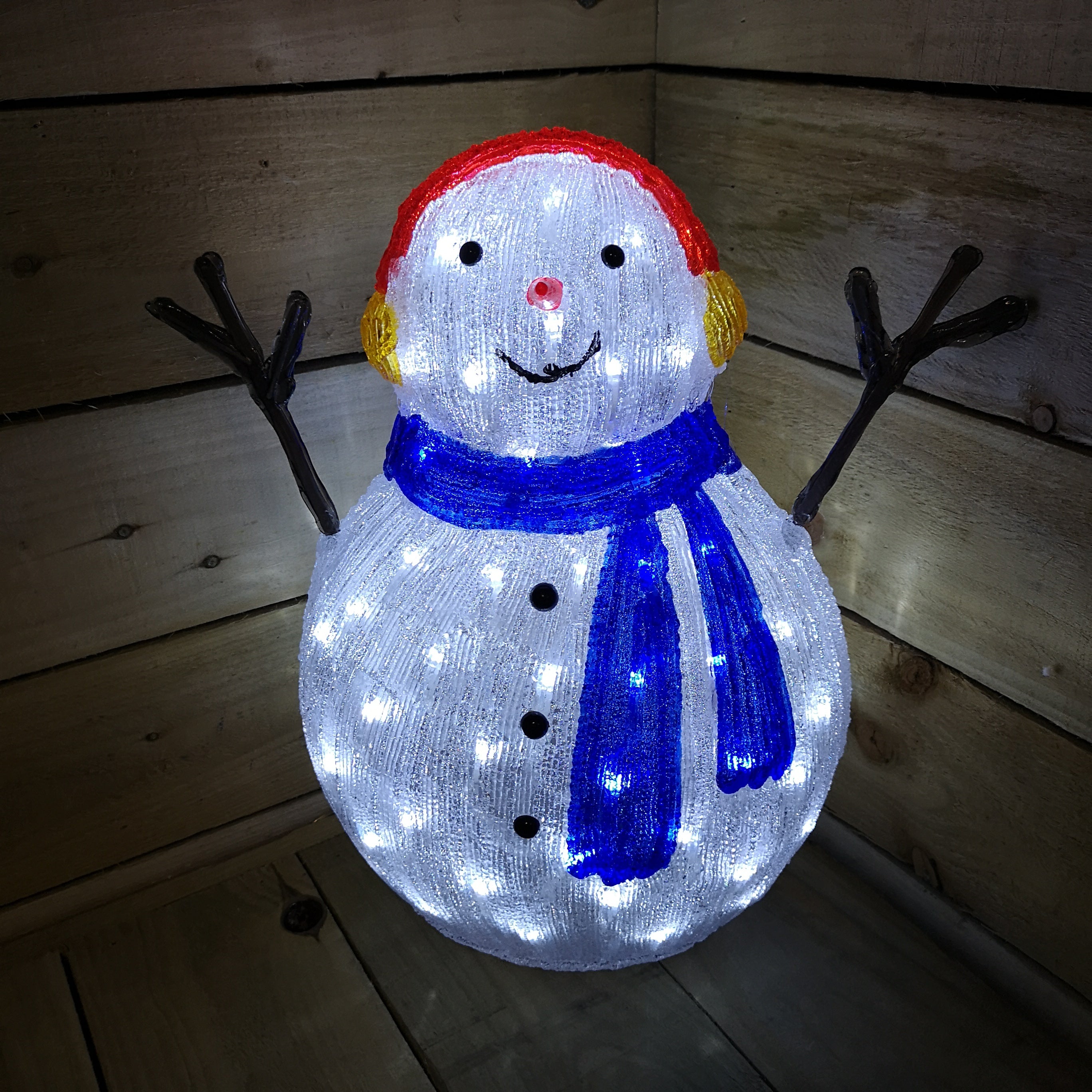 Lumineo 47cm  Acrylic Christmas Snowman Blue Or Green Scarf And Earmuffs Cool White LEDs