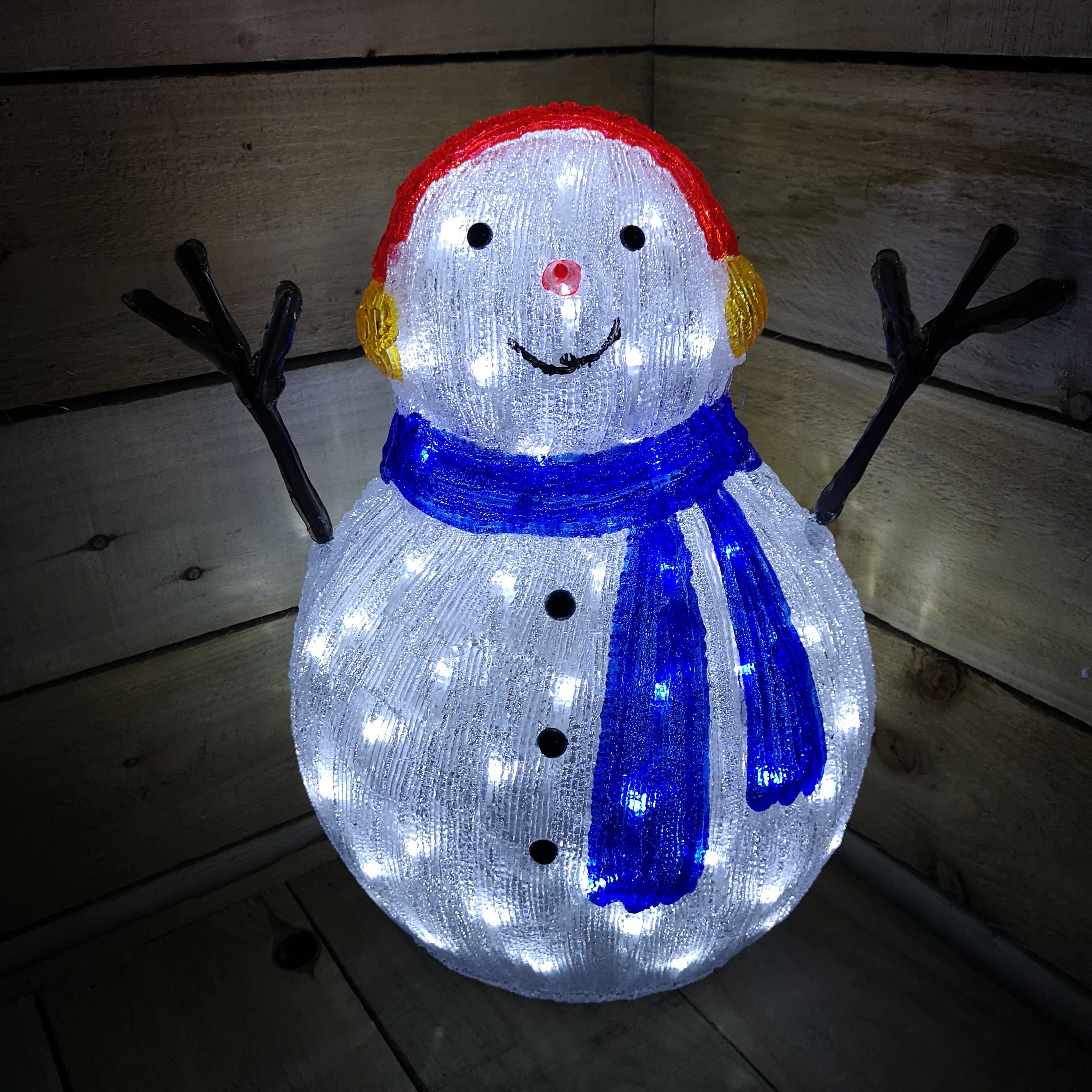 Lumineo 47cm Christmas Acrylic Snowman Blue Scarf And Earmuffs Cool White LEDs