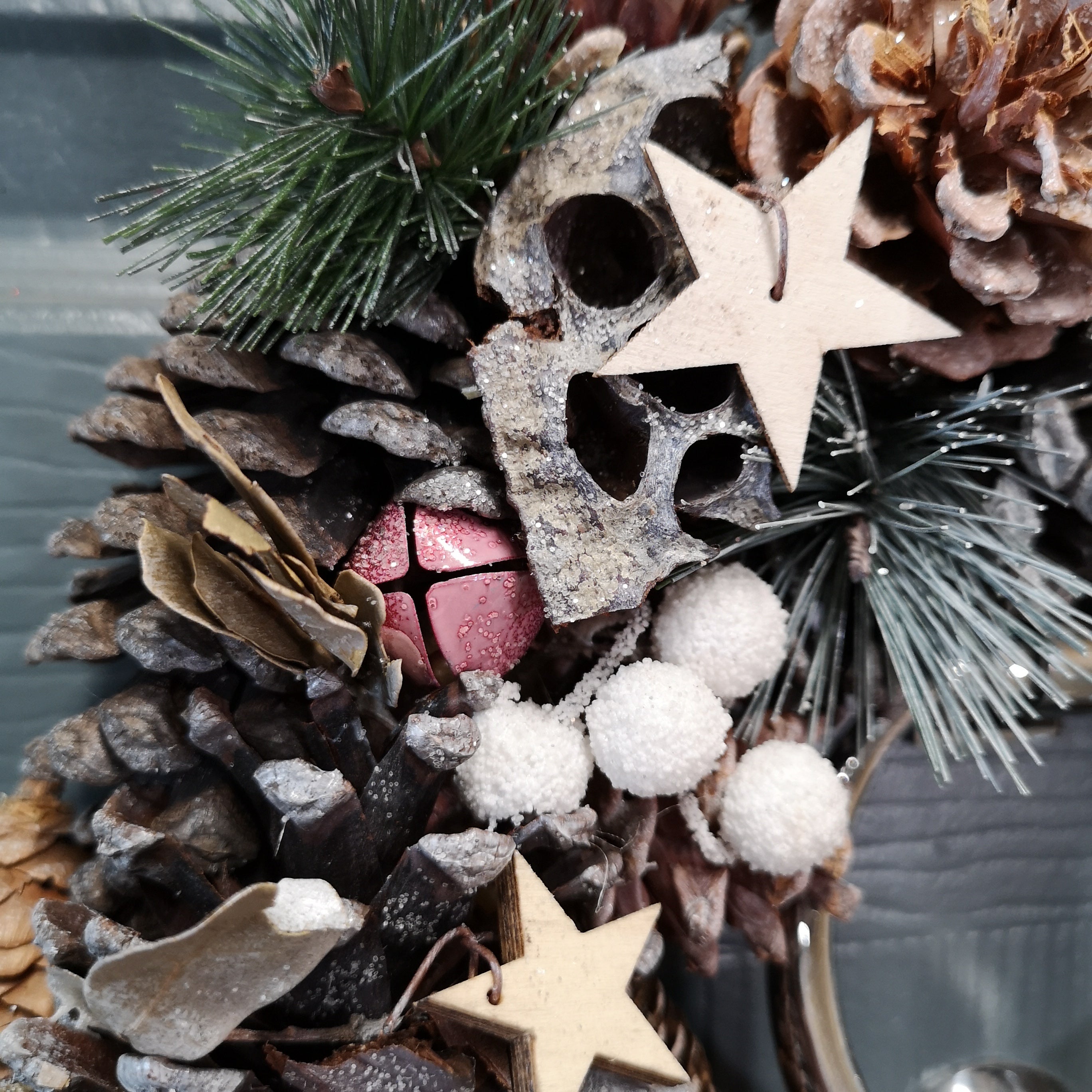 36cm Wooden Christmas White Berries Stars Bells and Grey Pine Cone Door Wreath