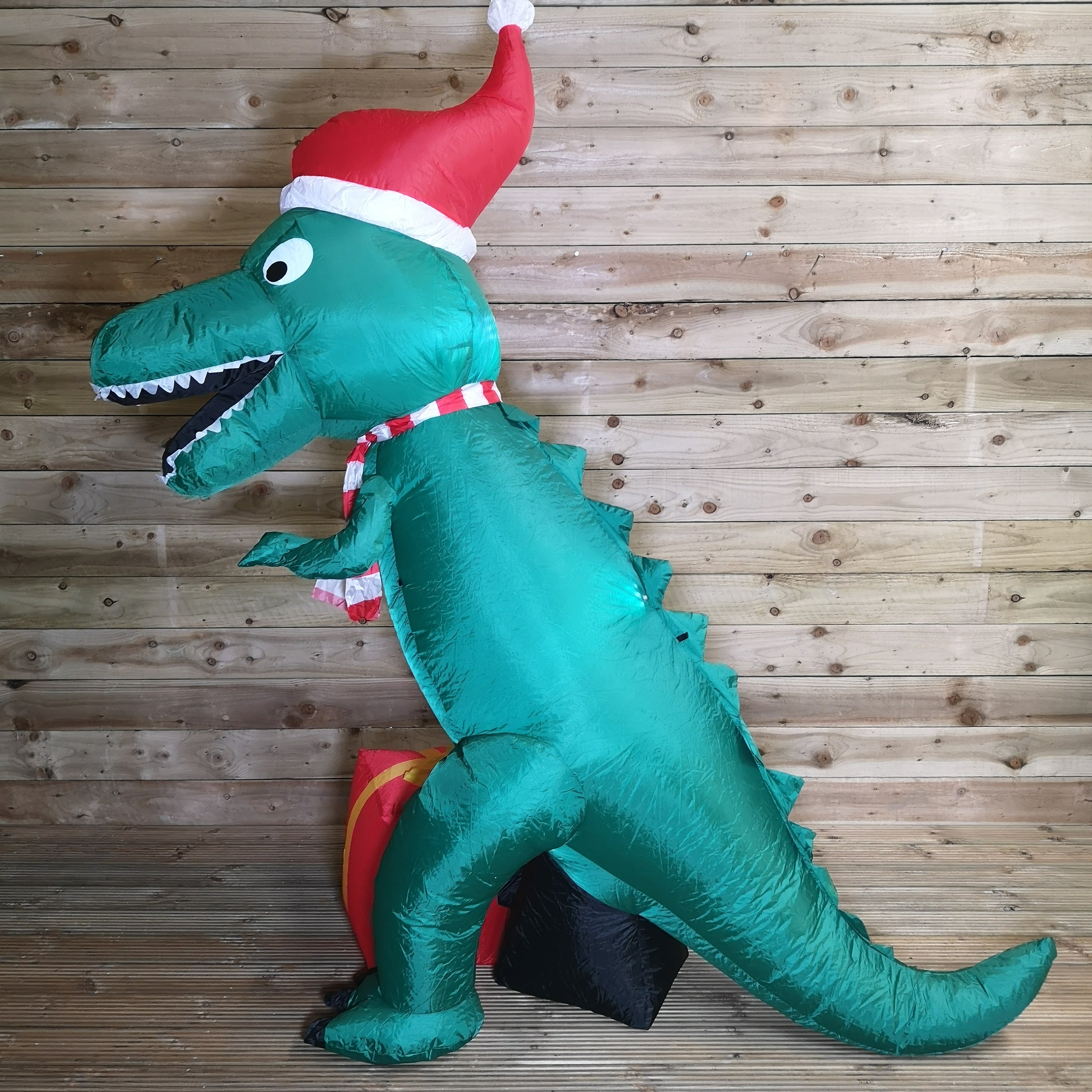 2.1m Premier Christmas Indoor Outdoor LED Inflatable T Rex Dinosaur in Santa Hat with Parcel
