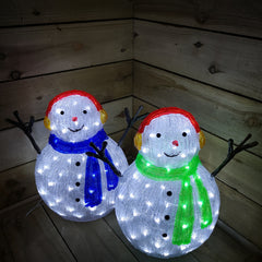 Lumineo 47cm  Acrylic Christmas Snowman Blue Or Green Scarf And Earmuffs Cool White LEDs