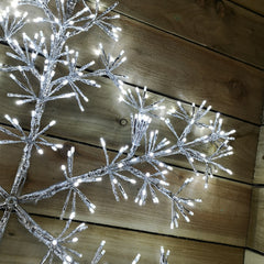 Premier 90cm Silver Starburst Snowflake Wall Window Decoration With 660 White LEDs