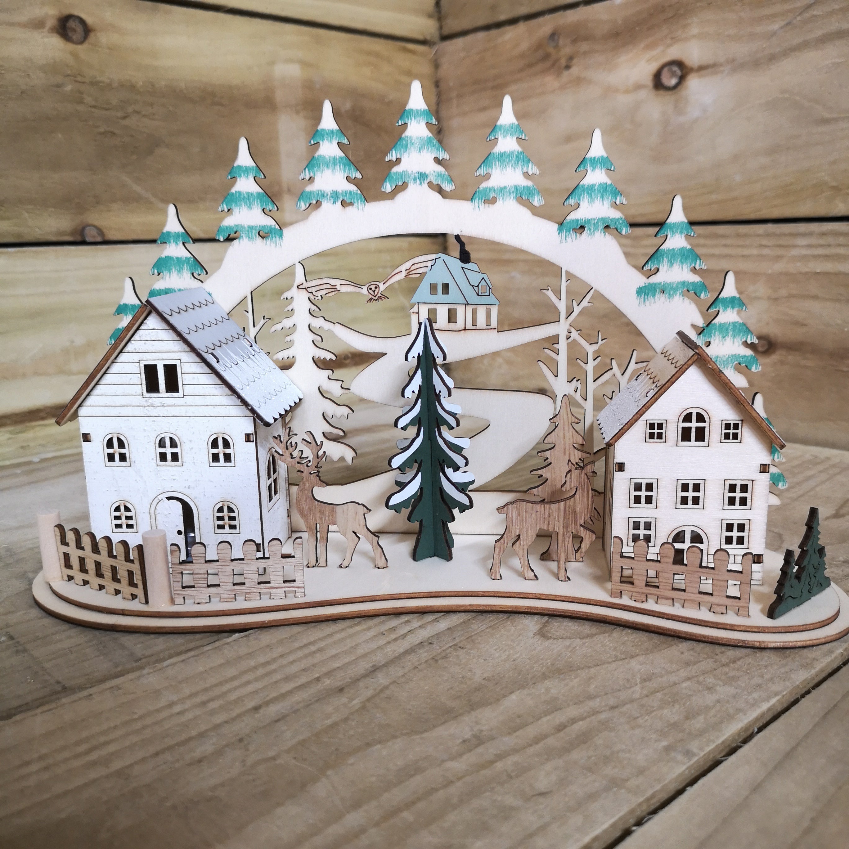 19cm Battery Operated Light up Warm White Christmas Winter Wooden Village Scene with Reindeer