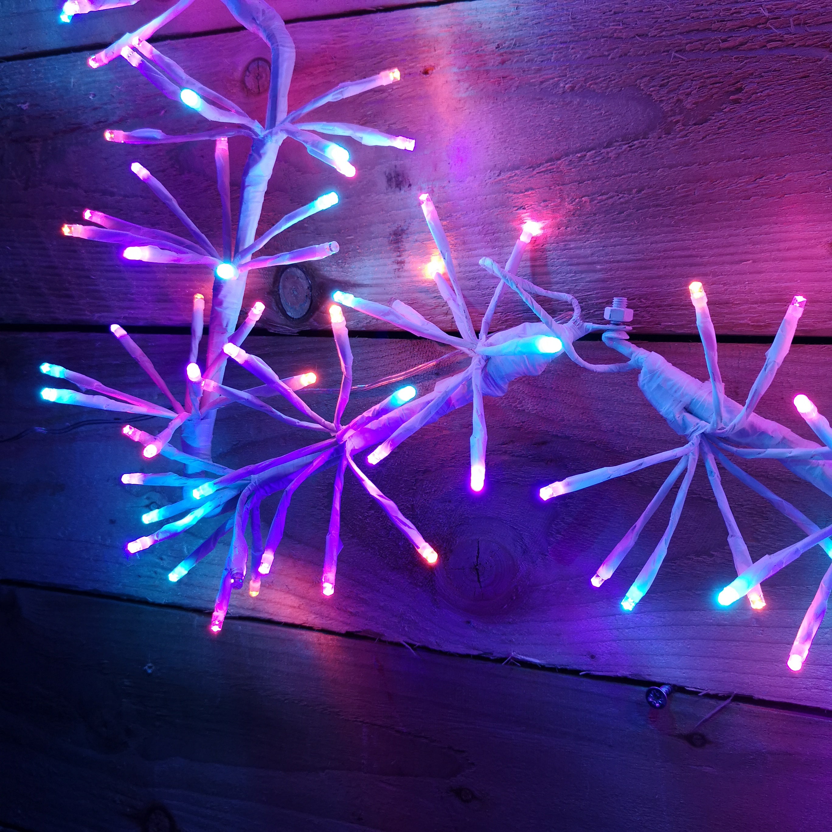60cm Premier Indoor Outdoor Christmas Twinkling Starburst LED Light in Rainbow  